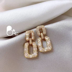 قیمت و خرید گوشواره درنیکا ترک استیل زنانه کپی طلا از سایت بیوتی