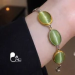 دستبند نگین اتریشی رنگ ثابت💎استیل آبکاری طلا | فری‌سایز | خاص و شیک
