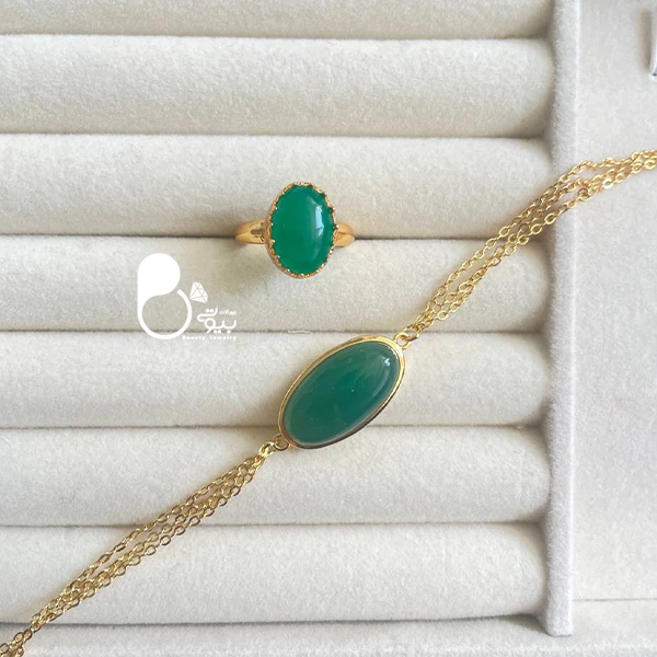 ست دستبند و انگشتر طرح زمرد💎کپی طلا با زنجیر خاص | شیک، خاص ست دستبند و انگشتر طرح زمرد💎کپی طلا با زنجیر خاص | شیک، خاص