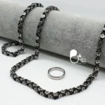 ست گردنبند و دستبند و انگشتر طرح طلا💎زنجیر بافته شده از گل نقره ای و مشکی