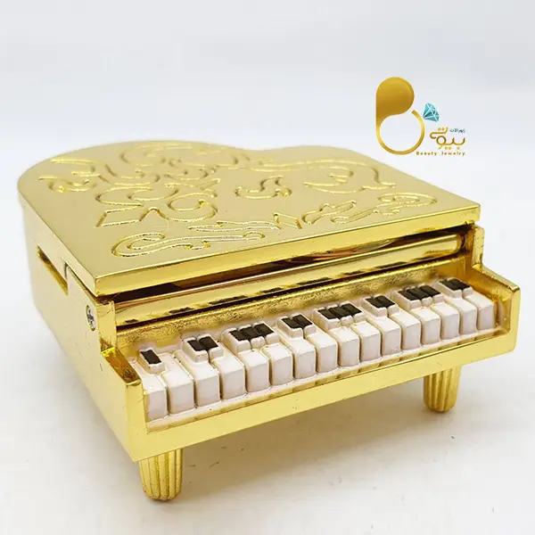 ساعت فانتزی طرح پیانو طلایی💎خاص و شیک با تخفیف ویژه ساعت فانتزی طرح پیانو طلایی💎خاص و شیک با تخفیف ویژه