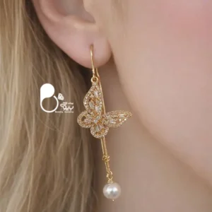 گوشواره پروانه عشق نگین باگت💎آویزدار بخیه‌ای | کپی طلا رنگ ثابت
