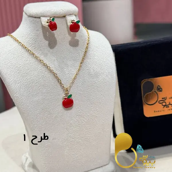 نیمست گوشواره و گردنبند دخترانه مدل اپل رنگ ثابت کپی طلا 💎 نیمست گوشواره و گردنبند دخترانه مدل اپل رنگ ثابت کپی طلا 💎