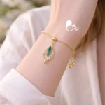 دستبند برگ نگین سبز با قفل آسانسوری کپی طلا