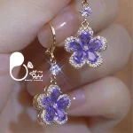 قیمت و خرید گوشواره گل بنفش ترک رنگ ثابت کپی طلا گوشواره آمترا وارداتی از ترکیه💎فروشگاه زیورآلات بیوتی