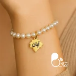قیمت و خرید دستبند مرواریدی برگ آبان حکاکی دار💎استیل روکش طلا دستبند ماه تولد مرواریدی استیل روکش طلا رنگ ثابت کپی طلا