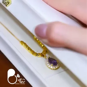 قیمت و خرید گردنبند نگین بنفش طرح جواهر از بیوتی