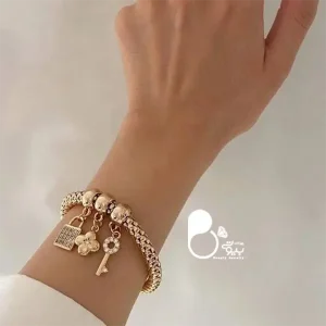 قیمت و خرید بنگل طرح قفل و کلید YSX 💎 دستبند آبکاری طلا با طراحی خاص از سایت بیوتی