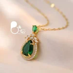 قیمت و خرید گردنبند شهرزاد زمردی سبز درباری💎استیل طلایی، ترند روز