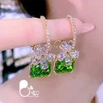 خرید گوشواره کپی طلا با نگین های سبز از سایت بیوتی