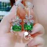 خرید گوشواره کپی طلا با نگین های سبز از سایت بیوتی