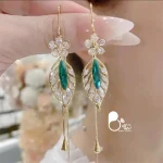 خرید گوشواره برگ آویز دار استیل ترک رنگ ثابت کپی طلا از بیوتی