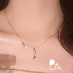 قیمت و خرید گردنبند گل صورتی با ترکیب مروارید مثل طلا از بیوتی