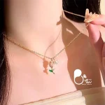 قیمت و خرید گردنبند گل صورتی با ترکیب مروارید مثل طلا از بیوتی
