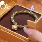 دستبند صدف و مروارید سبز 💎فروشگاه زیورآلات بیوتی
