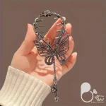 کلیپس گوجه ای طرح پروانه💎فروشگاه زیورآلات بیوتی