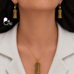 نیم‌ست زنانه طرح آویز طلایی مشکی مدل کندویی