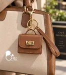 چارم بگ کیف چرمی قهوه‌ای