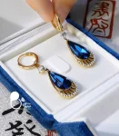 گوشواره زنانه ملودی یاقوت کبود استیل روکش طلا